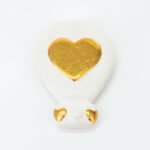 Calamita mongolfiera in porcellana oro